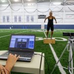 A test subject is measured for jump landing biomechanics using Physimax software by the department of kinesiology at the Mark R. Shenkman Training Center